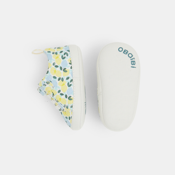 حذاء رياضي من القماش برسوم، باللون الأزرق لحديثي الولادة